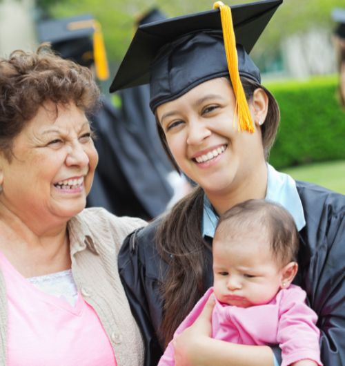 mom, daughter and baby graduating